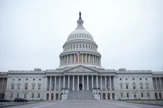 PROMO HIRES Government - Capitol Washington DC United States - iStock - Luka Banda View of the west front door of the United States capitol building under cloudy skies